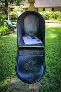 mailbox open with letter inside
