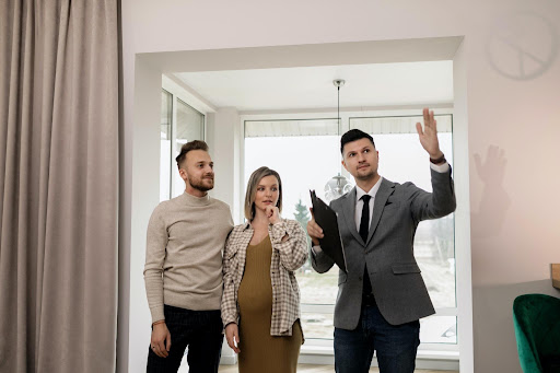 Real Estate agent showing a house