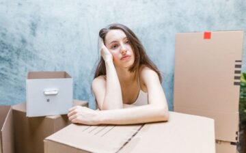 thoughtful-woman-with-moving-boxes.jpg