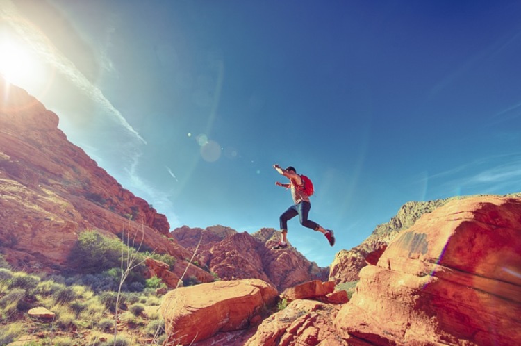 A person jumping off a cliff