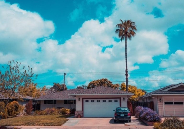 which one to buy first car or house