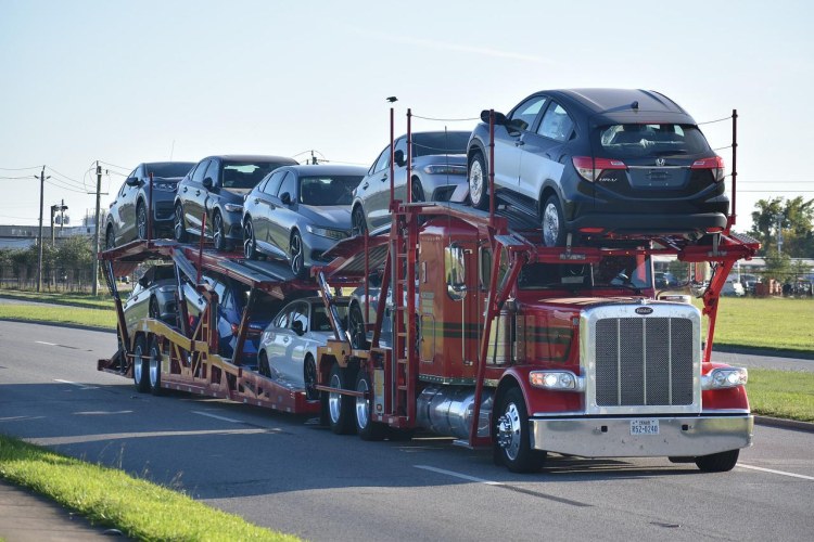 ship car in a carrier trailer