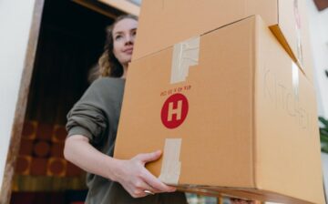 women holding a box