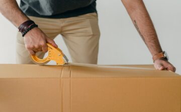 packing a box to move out