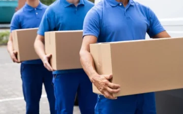 movers moving boxes with their hands