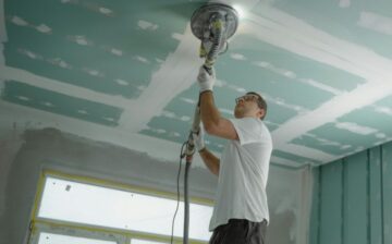 man working on house renovation