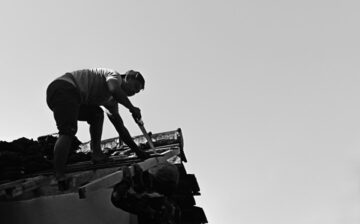 people working on roof