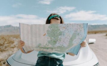 woman with map on route