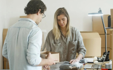 couple packing for moving