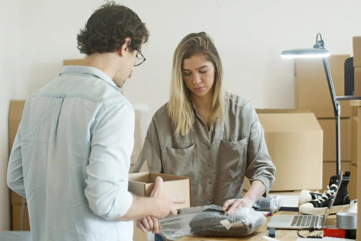 couple packing for moving