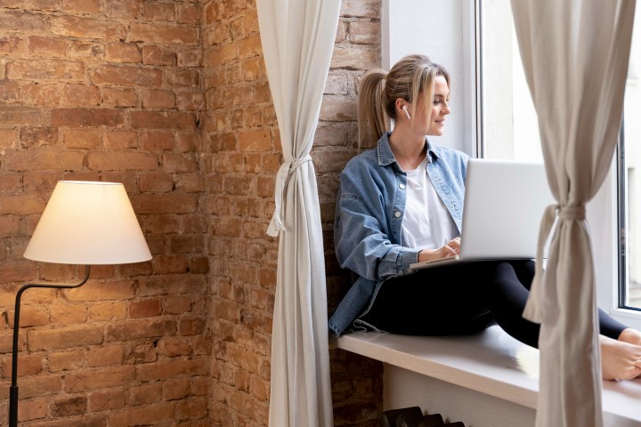 woman working with real estate computer