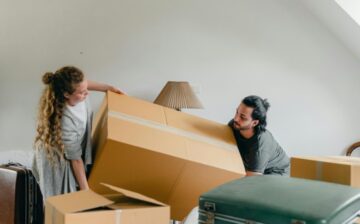 couple moving moving box