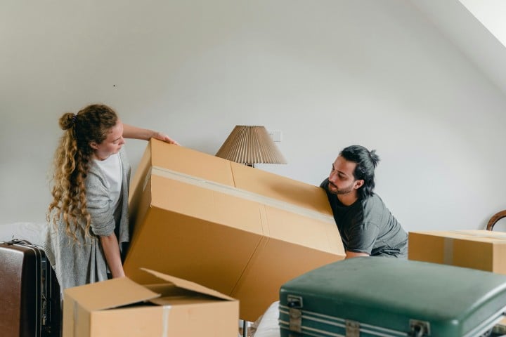 couple moving moving box