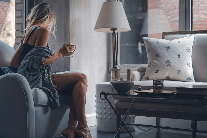 luxury bethroom with girl having coffee