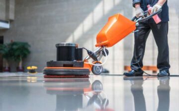 Man polishing the polisher in the lobby