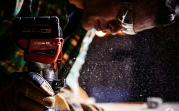 man working cutting wood