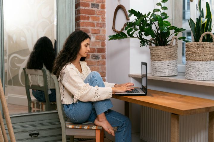 woman working laptop home