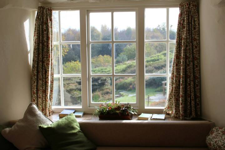 window with seat and cushions