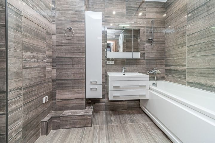bathroom decorated with wooden tiles