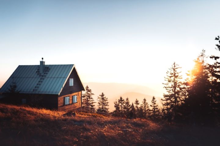 cabin in the middle of a mountain