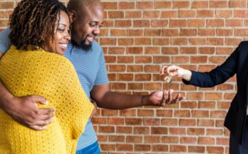 couple buy new house