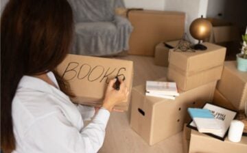 woman packing books