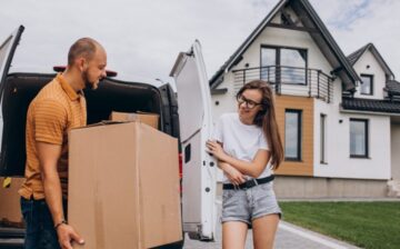 young family moving into their new house