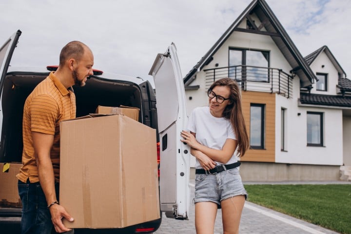 young family moving into their new house