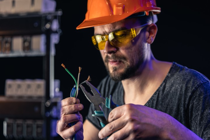 electrician working with cables