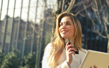 female real estate agent selling house
