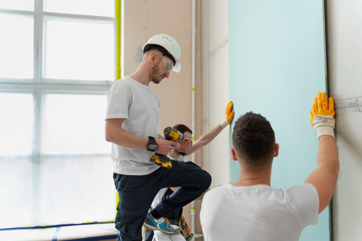 group of people working in a wall