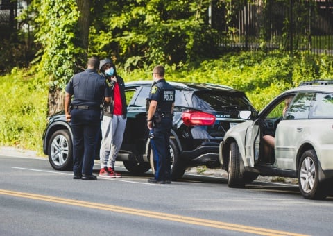 POLICE AT A CAR ACCIDENT LOCATION