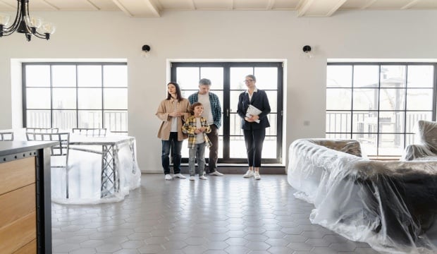 family is viewing a home