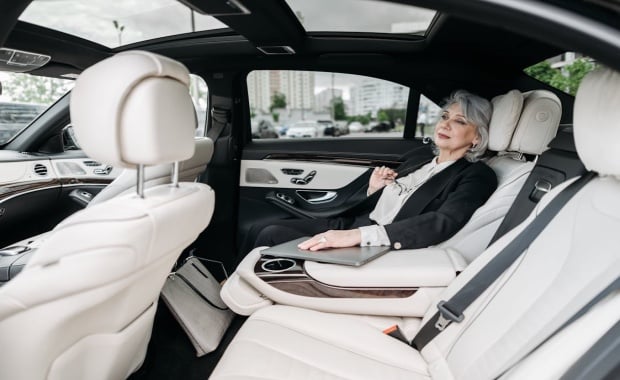 woman seating in a car