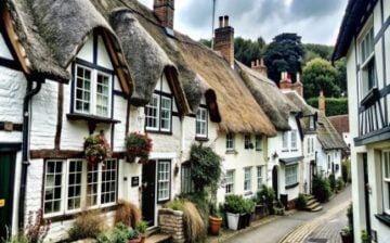 charming row white cottages with- hatched roofs